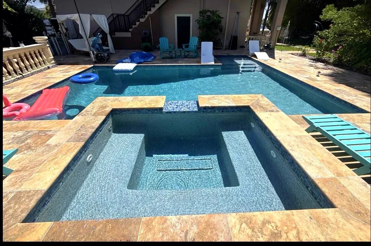 Sparkling residential pool and spa in Pinellas County FL maintained by Point of Pines Pools & Service